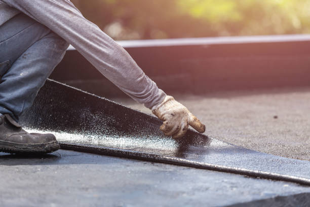 Professional Basement Waterproofing technician working in Rockford, MN